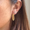 Boucles d'oreilles Créoles cordon ovales en or jaune 18K 58 Facettes REF2565-333
