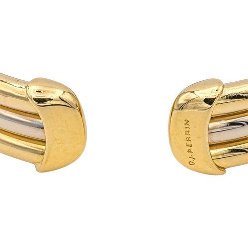 Bracelet O.J. Perrin - Bracelet rigide bicolore en or jaune et blanc 58 Facettes 1050174CN
