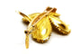 Broche Broche fleur vintage en or jaune 18 carats rubis et diamants 58 Facettes 1089906CD