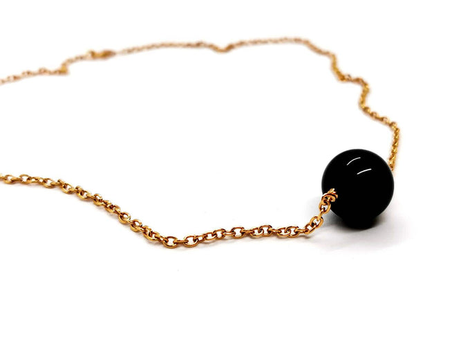 Collier Collier pendentif en or rose 18 carats et onyx 58 Facettes 1126007CN