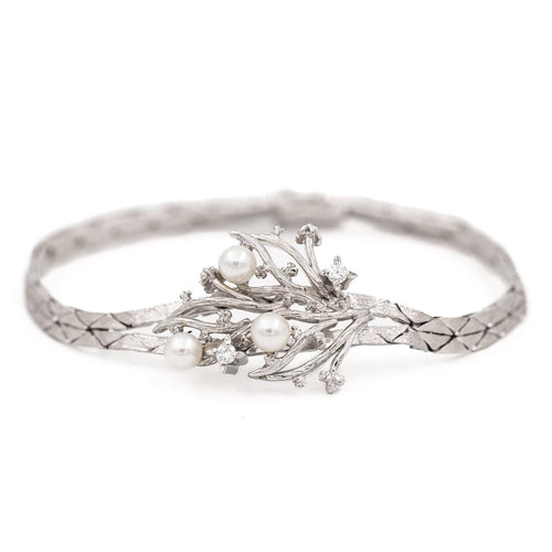 Bracelet Bracelet vintage motif feuillage en or blanc 18 carats, diamants et perles 58 Facettes 1142143CN