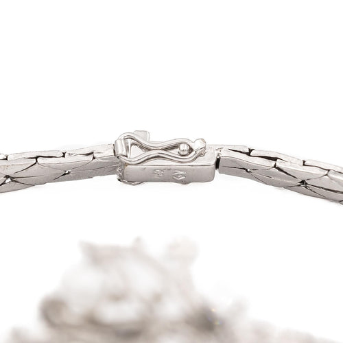 Bracelet Bracelet vintage motif feuillage en or blanc 18 carats, diamants et perles 58 Facettes 1142143CN