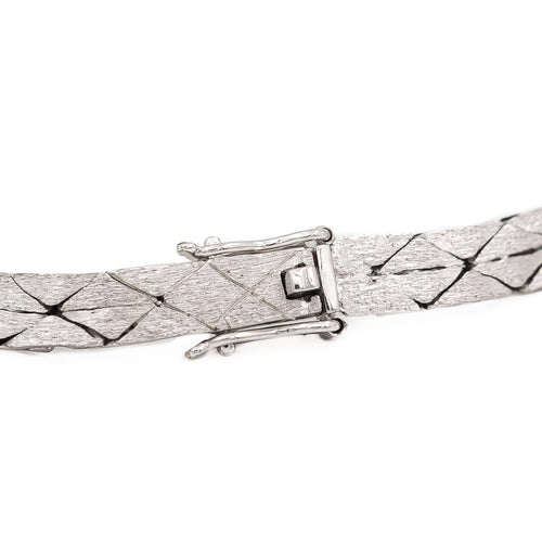 Bracelet Bracelet vintage motif feuillage en or blanc 18 carats, diamants et perles 58 Facettes 1142143CN