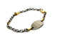 Bracelet Bracelet gourmette bébé bicolore en or jaune et or blanc 18 carats 58 Facettes 1180578CD