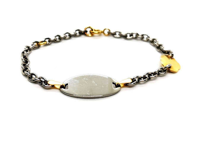 Bracelet Bracelet gourmette bébé bicolore en or jaune et or blanc 18 carats 58 Facettes 1180578CD