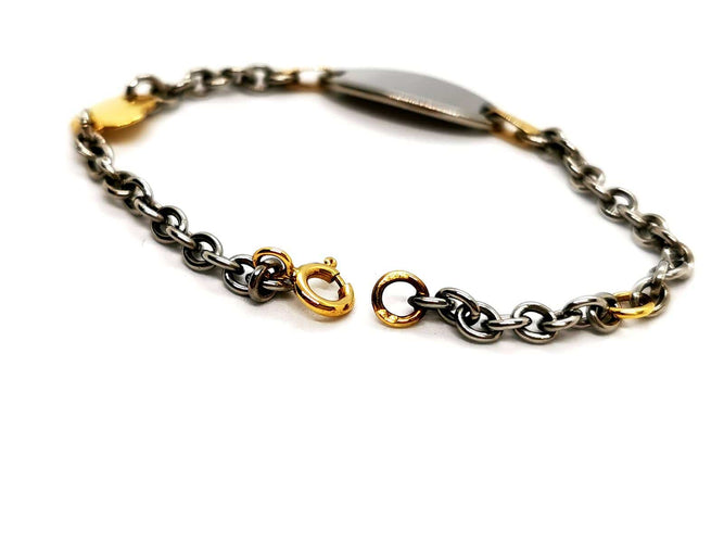 Bracelet Bracelet gourmette bébé bicolore en or jaune et or blanc 18 carats 58 Facettes 1180578CD
