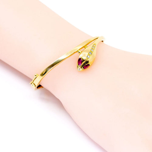 Bracelet Bracelet serpent en or 14 carats avec rubis et diamants 58 Facettes BE761473E43D42538A6A81CB32554F38