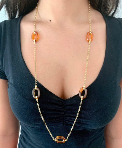 Collier Collier à maillons ovales en or jaune 14k et verre ambre sculpté 58 Facettes 10027