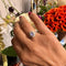 Bague 55.5 Bague entourage en platine avec pierre de lune et diamants 58 Facettes F34CC5ECF12042E8A56E179EA430E6B2