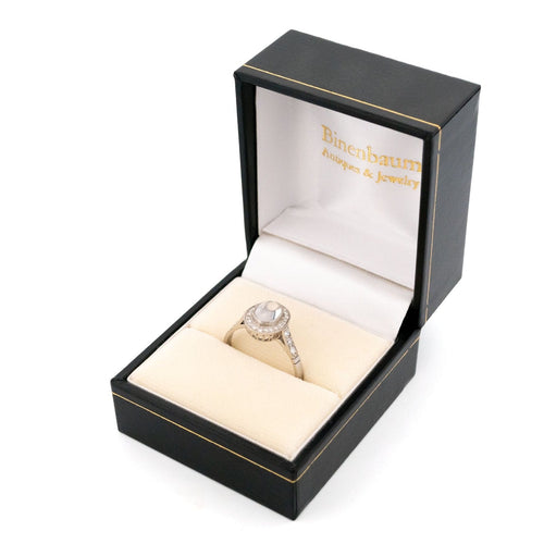 Bague 55.5 Bague entourage en platine avec pierre de lune et diamants 58 Facettes F34CC5ECF12042E8A56E179EA430E6B2