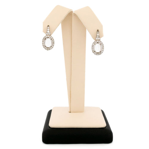 Boucles d'oreilles Boucles d’oreilles grappe en platine et or 18 carats, diamants et pierre de lune 58 Facettes 24D582833E2B4B0F85634FFA7DE88491