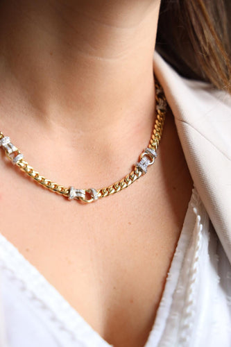Collier Collier maille gourmette en or jaune et blanc 18 carats et diamants 58 Facettes 1641586CN