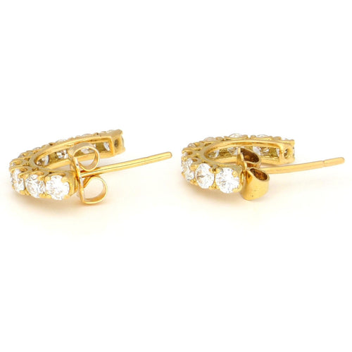 Boucles d'oreilles Boucles d'oreilles créoles en or jaune 18 carats et diamants 58 Facettes E4E86611FC5241C388E2BC3F779A76D0