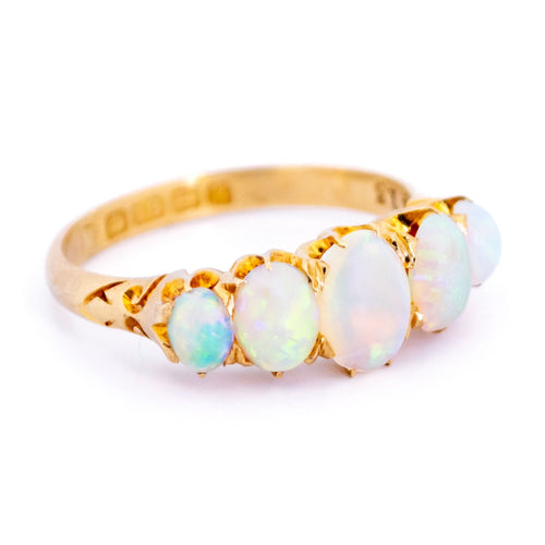 Bague 55 Bague cinq pierres en or jaune 18 carats et opales 58 Facettes 3613F170ED024DF7983473E9C4472394