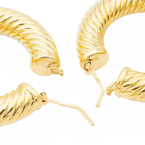 Boucles d'oreilles Boucles d'oreilles créoles torsadées en or jaune 18 carats 58 Facettes 1751503CN
