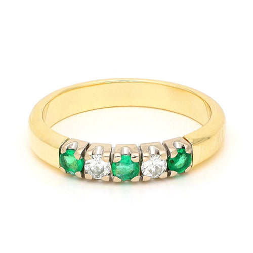 Bague 52.5 Bague ligne cinq pierres en or jaune et blanc 14 carats, diamants et émeraudes 58 Facettes 78A836AE470A492DA0A6D54A4C88D17D