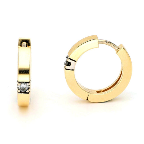Boucles d'oreilles Boucles d'oreilles créoles vintage en or jaune et or blanc avec diamants 58 Facettes 1136CDC91D8A45359177DB346FFA7D7F
