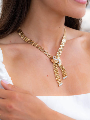 Collier Collier négligé en or jaune et platine serti de diamants 58 Facettes 1986222CN