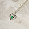 Collier Collier avec pendentif cœur en or blanc 14 carats, diamants et émeraude 58 Facettes 2743