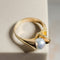 Bague 60 Lapponia - Bague en or jaune 14 carats avec perle grise 58 Facettes 2896