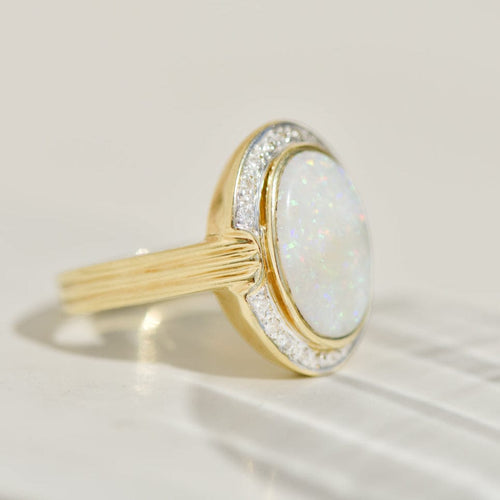 Bague 58 Bague vintage en or jaune 14K avec opale et diamants 58 Facettes 2354