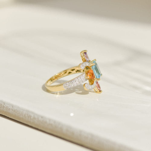 Bague 56 Bague en or jaune 18 carats avec topaze, pierres fines et diamants 58 Facettes 2654
