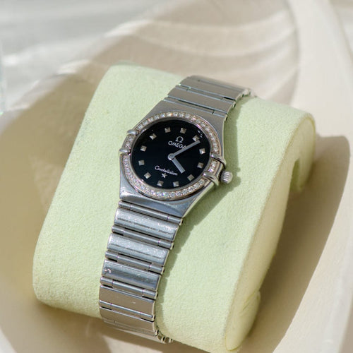 Montre Omega Constellation - Montre femme en acier inoxydable avec lunette diamants 58 Facettes 1923