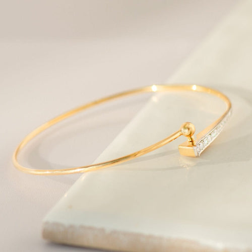 Bracelet Bracelet jonc en or jaune 18 carats avec 12 diamants 58 Facettes