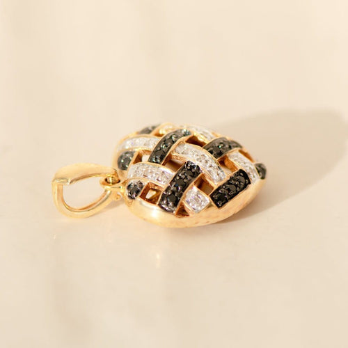 Pendentif Pendentif cœur en or jaune 14 carats avec diamants blancs et noirs 58 Facettes