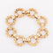 Bracelet Chaumet - Bracelet à anneaux torsadés en or jaune 18k 58 Facettes 1