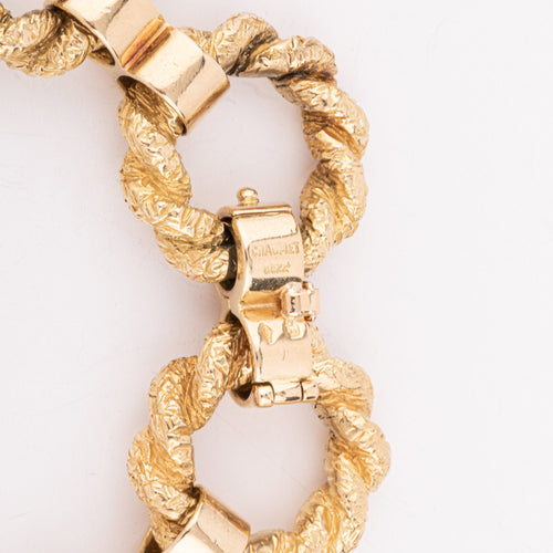 Bracelet Chaumet - Bracelet à anneaux torsadés en or jaune 18k 58 Facettes 1