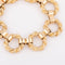 Bracelet Chaumet - Bracelet à anneaux torsadés en or jaune 18k 58 Facettes 1