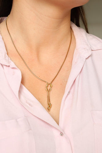 Collier Collier négligé maille serpent en or jaune 18 carats 58 Facettes 2220298CN