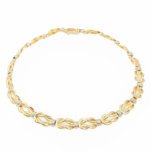 Collier Christofle - Collier motif nœud plat en or jaune et or blanc 58 Facettes 2238751CN