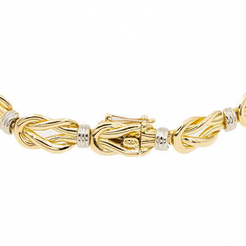 Collier Christofle - Collier motif nœud plat en or jaune et or blanc 58 Facettes 2238751CN