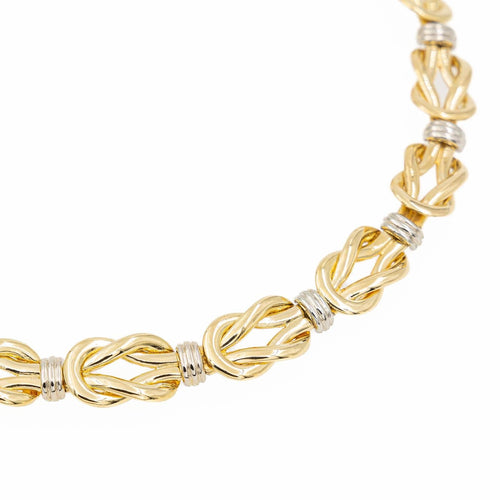 Collier Christofle - Collier motif nœud plat en or jaune et or blanc 58 Facettes 2238751CN