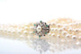 Collier Collier trois rangs de perles de culture en or blanc 18k 58 Facettes 24812