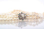 Collier Collier trois rangs de perles de culture en or blanc 18k 58 Facettes 24812