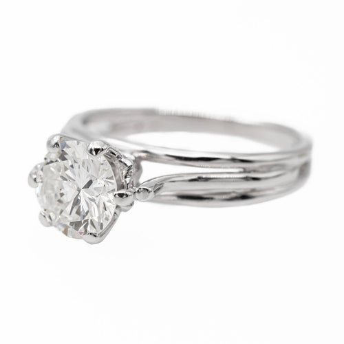 Bague 50 Bague solitaire en or blanc 18 carats avec diamant 58 Facettes 2537614CN