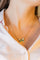 Collier Collier papillon en or jaune 18 carats, émeraudes et diamants 58 Facettes 2601193CN