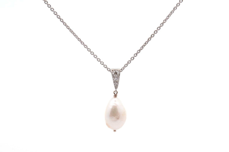 Pendentif Pendentif vintage en platine avec perle de culture et diamants 58 Facettes 26174
