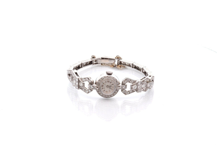 Montre Montre Art déco en or blanc 18k et diamants 58 Facettes 26620dv