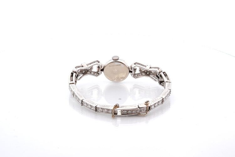 Montre Montre Art déco en or blanc 18k et diamants 58 Facettes 26620dv