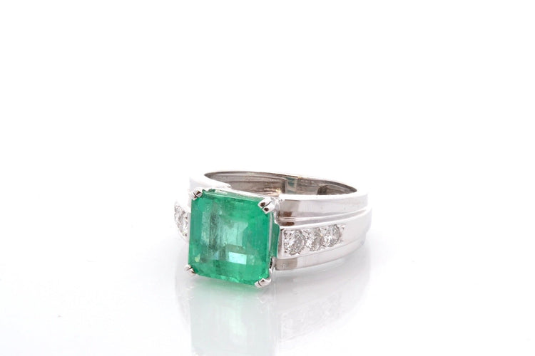 Bague 55 Bague vintage en platine avec émeraude 4,39 ct et diamants 58 Facettes 25822A - 27164