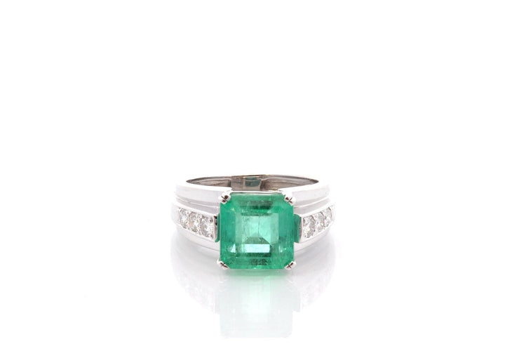 Bague 55 Bague vintage en platine avec émeraude 4,39 ct et diamants 58 Facettes 25822A - 27164