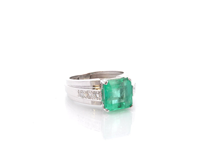 Bague 55 Bague vintage en platine avec émeraude 4,39 ct et diamants 58 Facettes 25822A - 27164