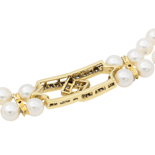 Bracelet Bracelet en or jaune 18 carats avec diamants et perles de culture 58 Facettes 2728212CN