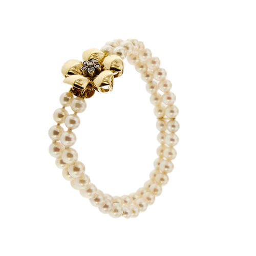 Bracelet Bracelet double rang de perles et diamants en or jaune 18 carats 58 Facettes 27351