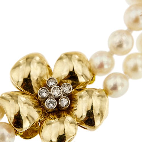 Bracelet Bracelet double rang de perles et diamants en or jaune 18 carats 58 Facettes 27351