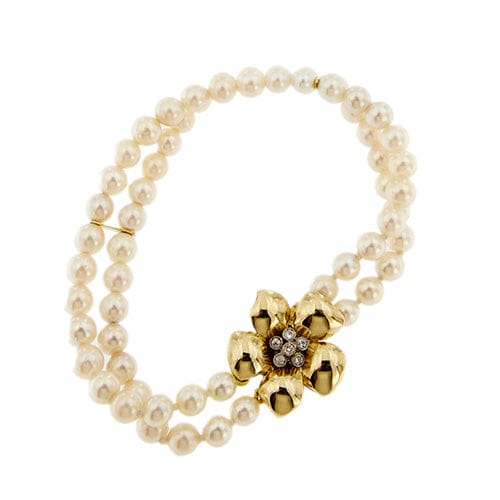 Bracelet Bracelet double rang de perles et diamants en or jaune 18 carats 58 Facettes 27351